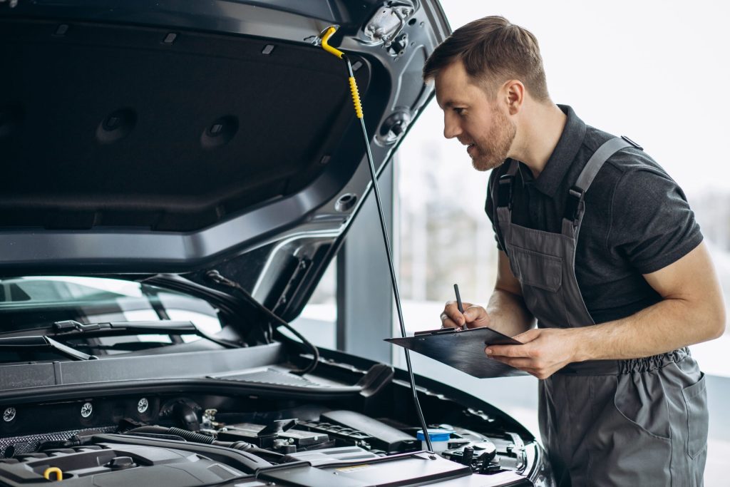 car-mechanic-car-service-checking-up-car