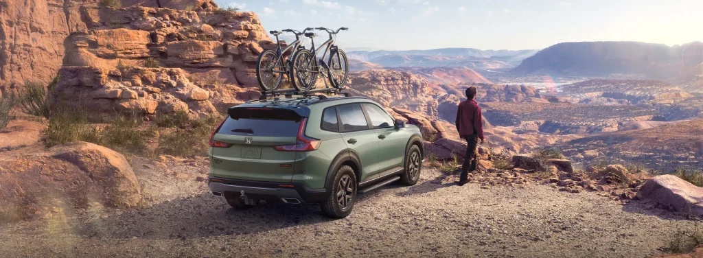 Green 2026 Honda CR-V parked overlooking mountains