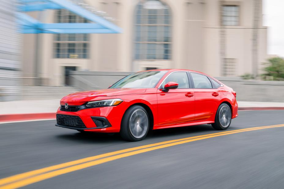 Red Honda Civic driving
