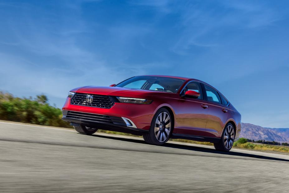Red 2023 Honda Accord driving