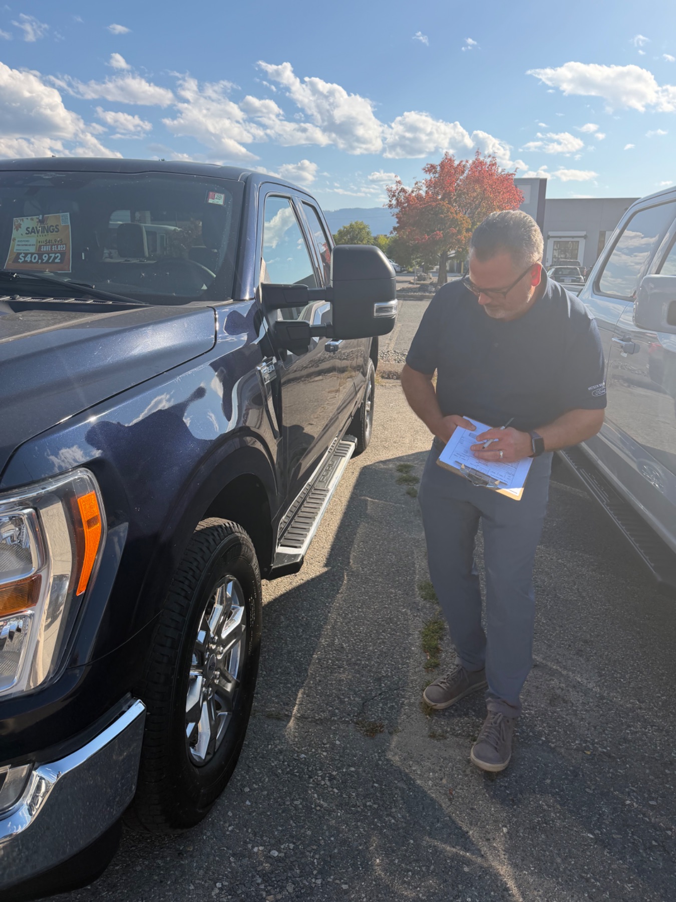 Trevor doing a walk-through on used vehicle