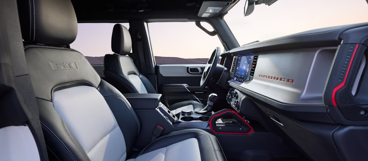 Ford Bronco 60th Anniversary Edition interior with the 60 logo embossed on the leather front seat