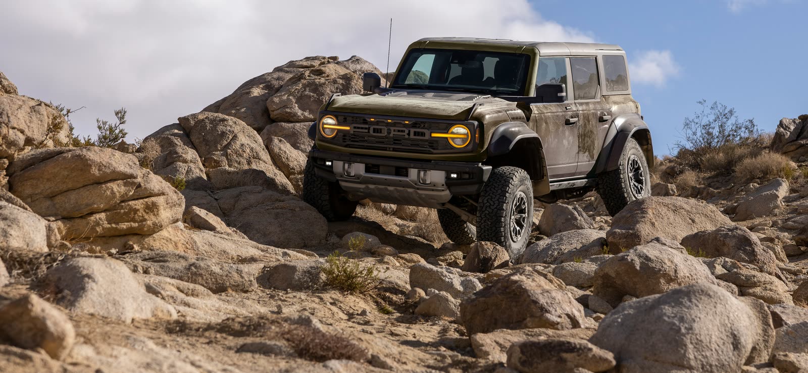 2026 Ford Bronco Raptor crawling over desert boulders