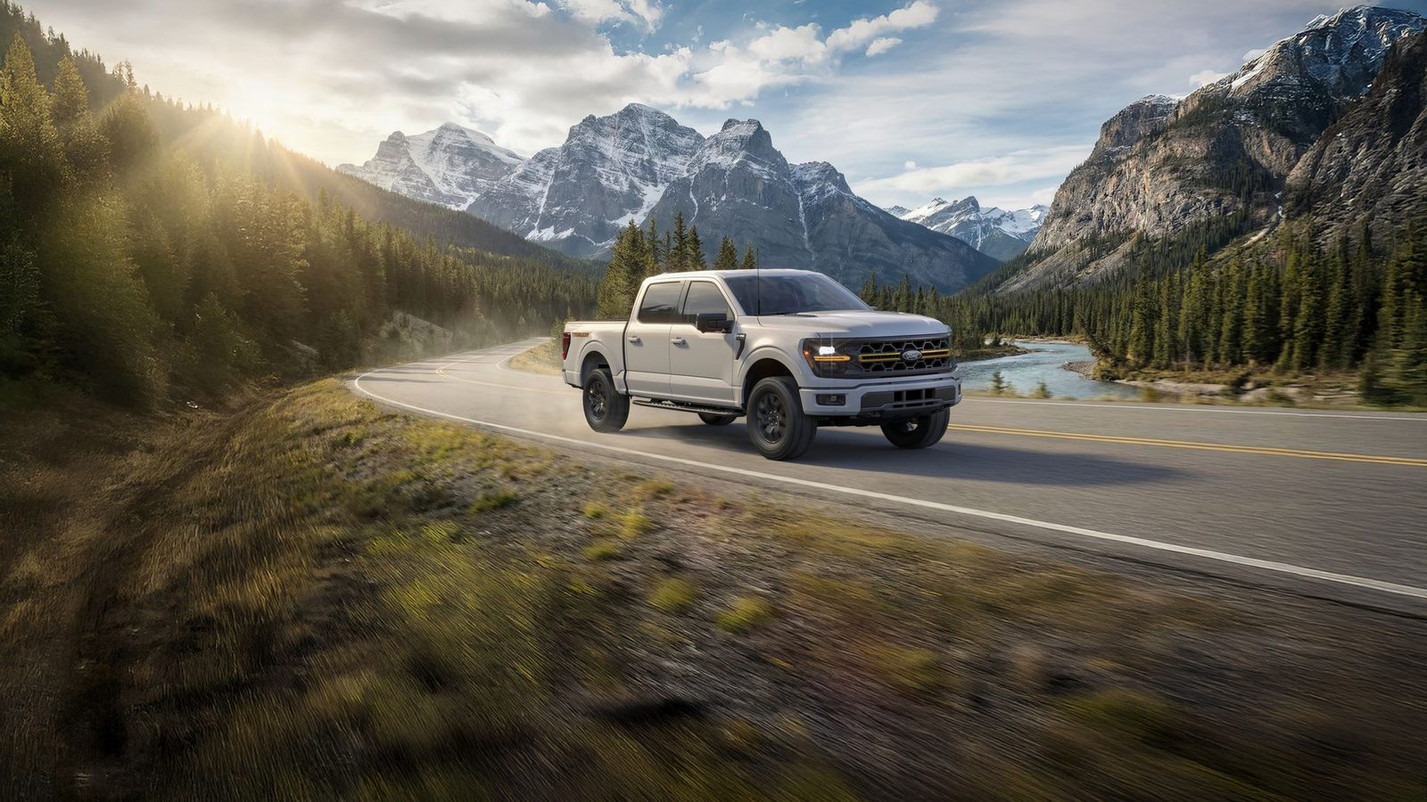 White Ford F-150 Tremor on a mountain highway, October F-150 offers at Watkin Motors Ford in Vernon