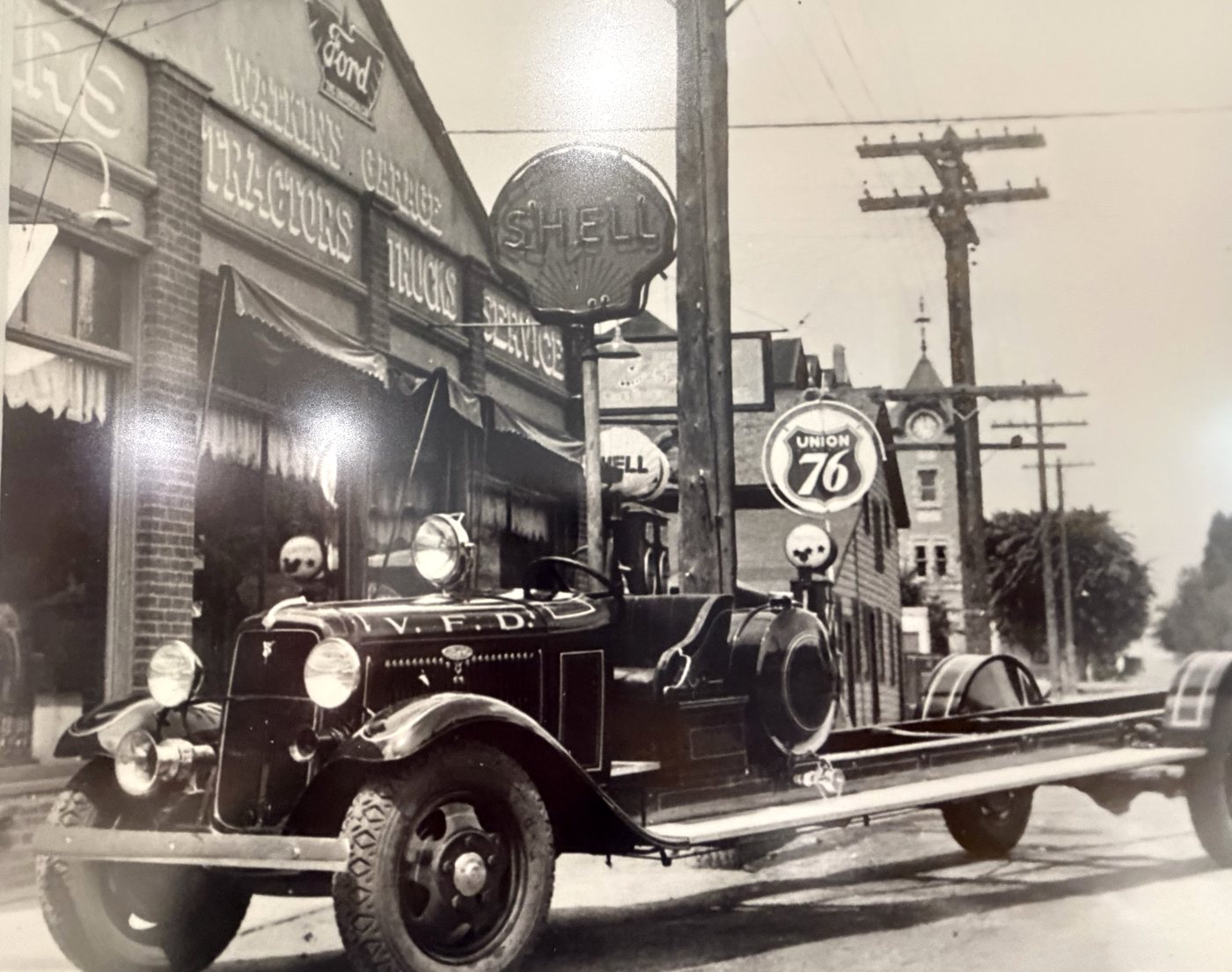 Vintage Vernon Fire Department truck parked outside the Watkin dealership