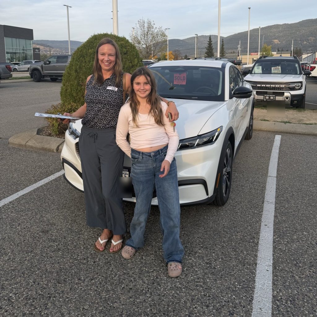 Mother and daughter with their new Ford at Watkin Motors Ford