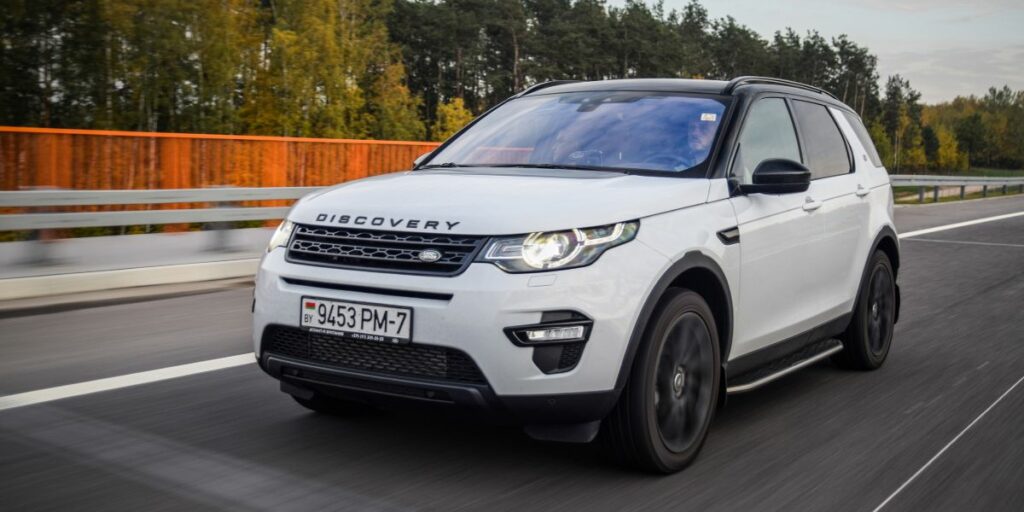 land rover discovery sport driving on highway